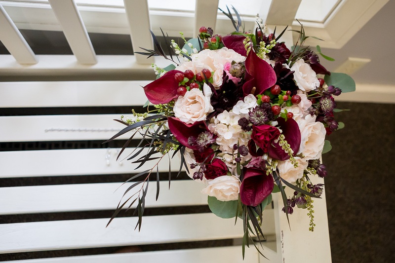 What Are The Bouquets Of The Bride Are In Burgundy Color?
